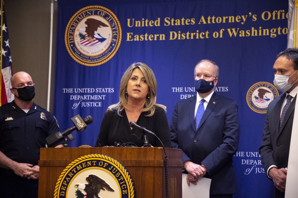 Mayor Nadine Woodward speaks at a press conference, Wednesday, Oct. 21, 2020, at the federal courthouse in Spokane about a new campaign aimed at educating the public about illicit Fentanyl, which can be deadly in doses as small as two milligrams. She appeared with Spokane Police Chief Craig Meidl, left, U.S. Attorney Bill Hyslop and DEA Special Agent Keith Weis, right.  (Jesse Tinsley/The Spokesman-Review)
