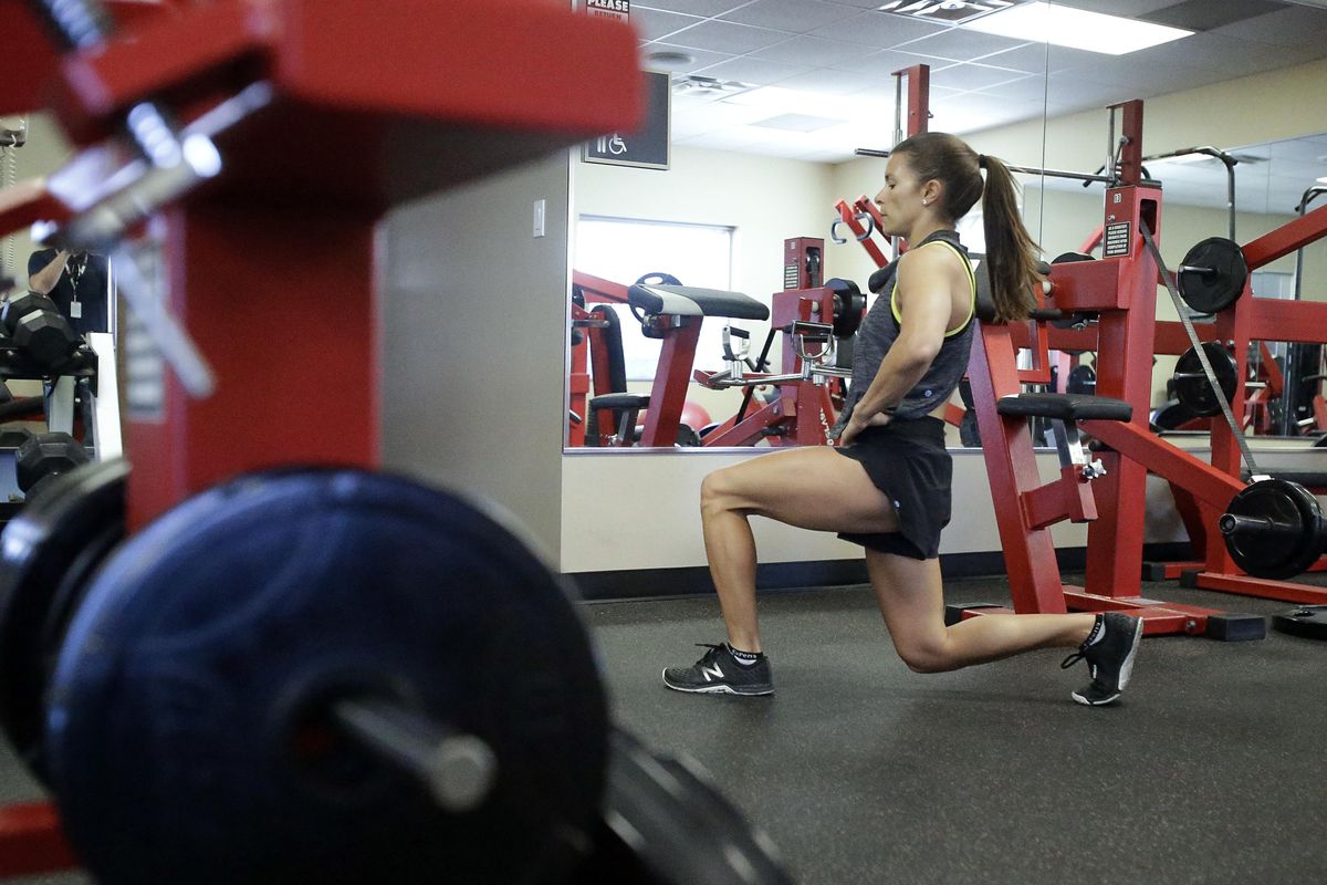 In this Saturday, Feb. 18, 2017, photo, Danica Patrick works out at Daytona International Speedway, in Daytona Beach, Fla. Patrick is really serious about health and clean eating, and as her driving days may be nearing an expiration date, a second career in lifestyle and fitness could be up next. (John Raoux / Associated Press)