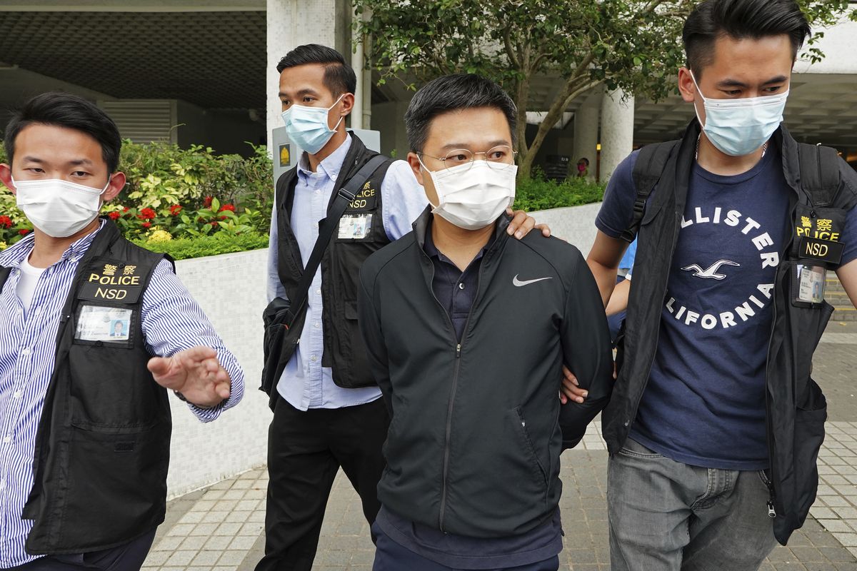 Ryan Law, second from right, Apple Daily