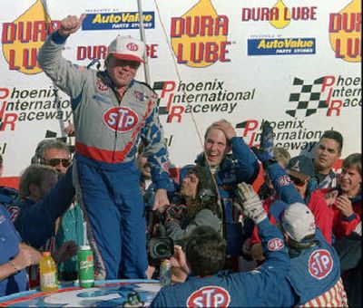 
Bobby Hamilton Sr. celebrates after winning his first Winston Cup event, the 1996 Dura Lube 500 at Phoenix. 
 (File Associated Press / The Spokesman-Review)