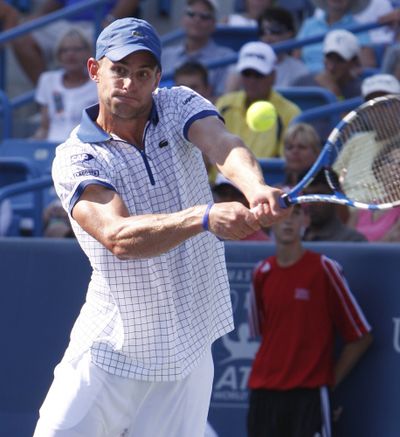Andy Roddick beat Novak Djokovic to advance to the semifinals.  (Associated Press)