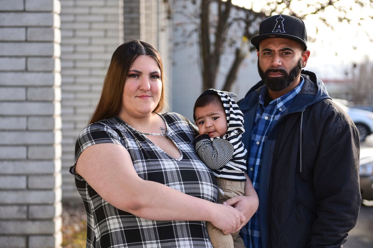 Cheyanne Sciacqua and Anthony Morris with their 6-month-old son Jordan outside their residence at the FairBridge Inn & Suites in Kalispell on Jan. 19.  (Casey Kreider)