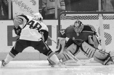 
Sabres center Daniel Briere (48) works the puck past Atlanta goaltender Kari Lehtonen for a shootout goal.
 (Associated Press / The Spokesman-Review)