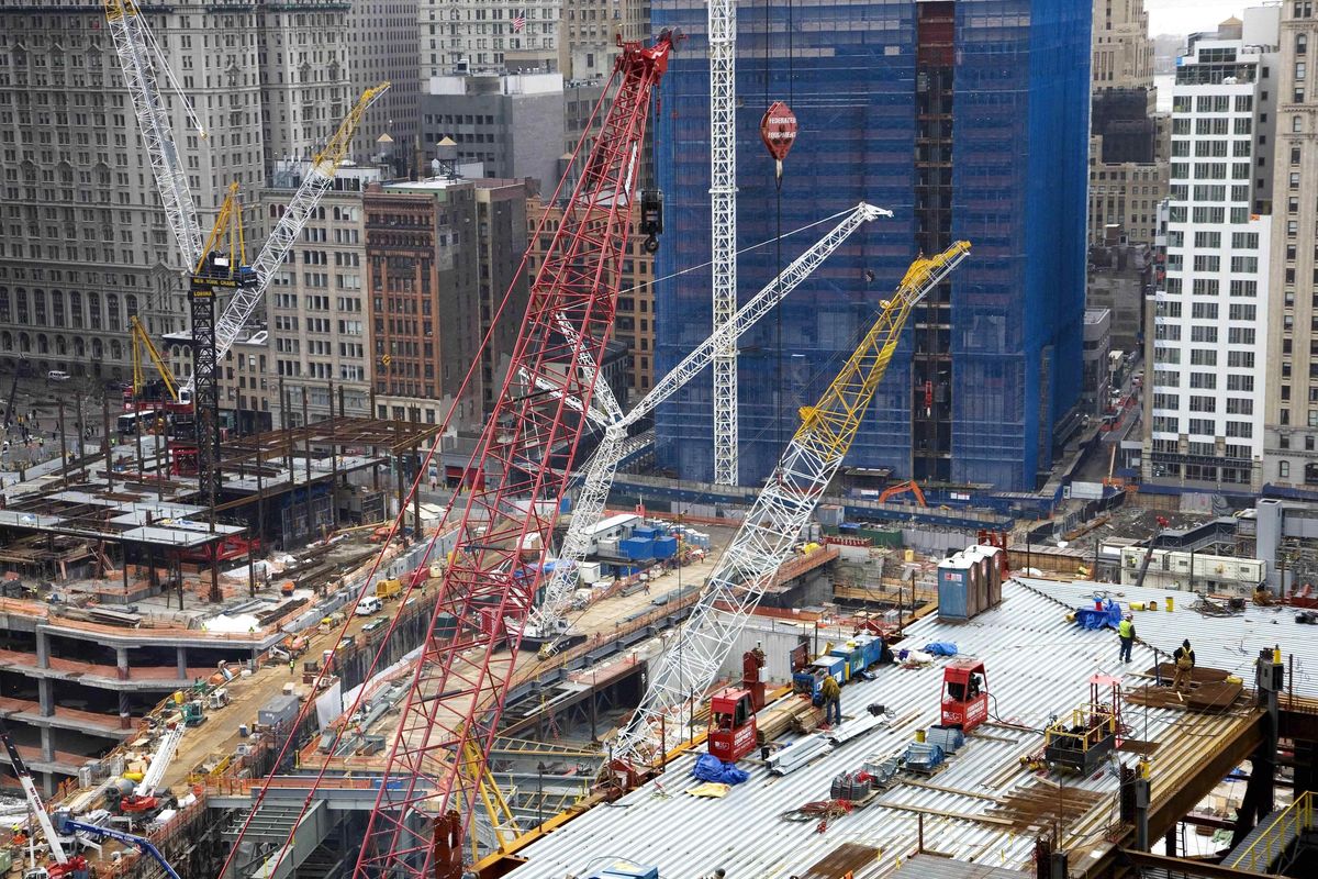 The World Center Hotel, right, overlooks the construction site.