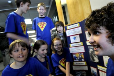 Seven Lakeland School District fifth-graders from the STRIVE program are taking their idea to reduce school bus emissions to the European Children’s Climate Call in Denmark. The Super Seven students are (back, from left) Ross Jenkins and Cameron March; (front, from left) Tyler Siegford, Magen Daniels, Shelby Cass and Hayden Zeimantz; and (far right) Rohnin Randles.  (Kathy Plonka / The Spokesman-Review)
