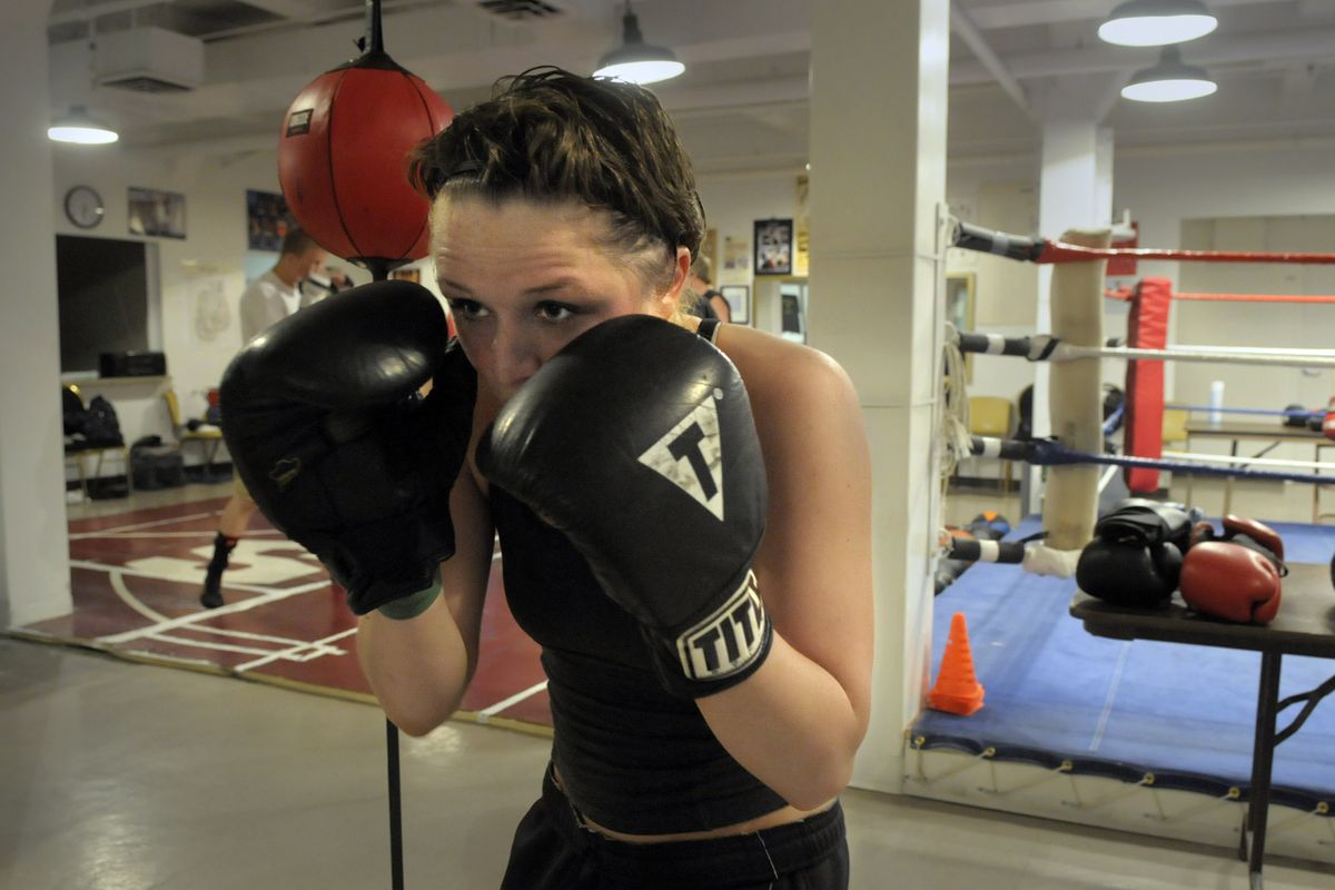 Chynna Nibler works on her pugalistic skills by throwing punches in front of a mirror at the Howard Street Boxing Club on Wednesday, May 27, 2009. Having survived cancer she is back in the gym after attending college in Bellingham. (Christopher Anderson / The Spokesman-Review)