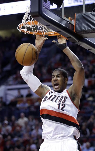 Blazers forward LaMarcus Aldridge throws down against Houston. (Associated Press)