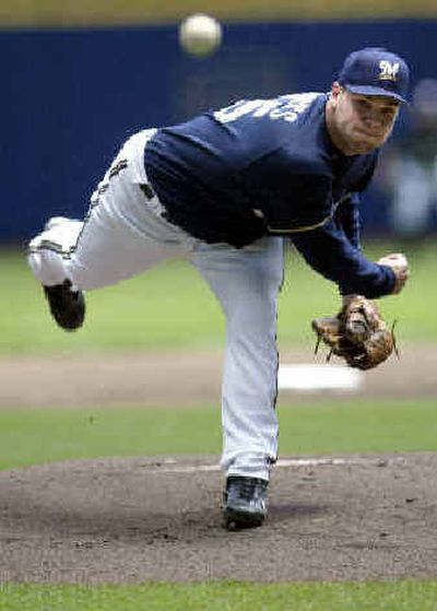 
Milwaukee's Ben Sheets delivers a pitch during the first inning against the Atlanta Braves on Sunday. Milwaukee's Ben Sheets delivers a pitch during the first inning against the Atlanta Braves on Sunday. 
 (Associated PressAssociated Press / The Spokesman-Review)