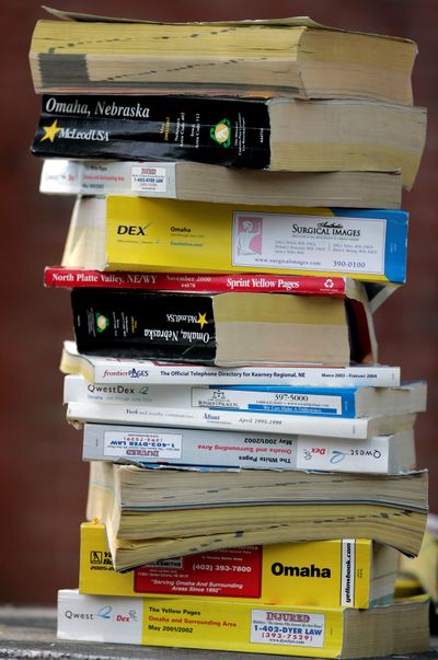 Some cities and states are working to limit the $17 billion-a-year phone book industry, but so far all attempts have been unsuccessful. (Associated Press / The Spokesman-Review)