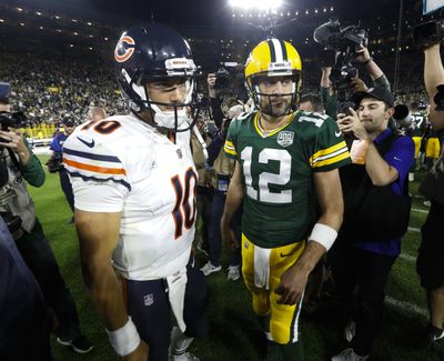 In this Sept. 9, 2018, photo, Chicago Bears' Mitchell Trubisky, left, talks to Green Bay Packers' Aaron Rodgers after the Packers defeated the Bears 24-23 in an NFL football game in Green Bay, Wis. Clinch the NFC North championship and beat a division rival to do it? The Chicago Bears couldnt have asked for a sweeter scenario. (Mike Roemer / Associated Press)