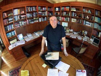 
Author James Patterson stands at a round pine table in a small second-floor office, where he mostly writes, in his Palm Beach, Fla. home. Patterson has published 35 books, 18 of which hit No. 1 on the New York Times best-seller list. He's sold 100 million copies, grossing $1 billion in sales. 
 (Associated Press / The Spokesman-Review)