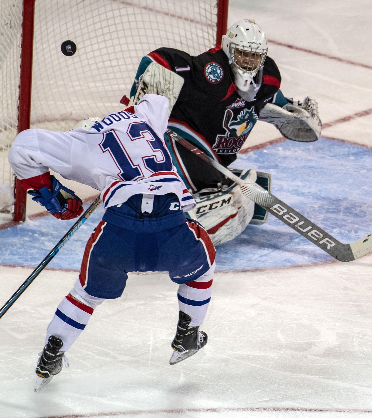 Kelowna Rockets goalie James Porter (1) deflects the puck during the second period of a WHL hockey game Feb. 1, 2019, at the Spokane Arena. Colin Mulvany/THE SPOKESMAN-REVIEW (Colin Mulvany / The Spokesman-Review)