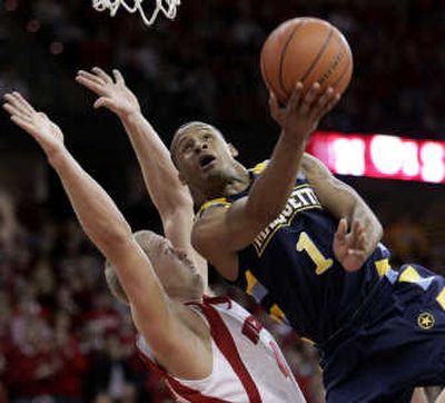 
Dominic James, right, scored 20 points to lead Marquette past Wisconsin.Associated Press
 (Associated Press / The Spokesman-Review)