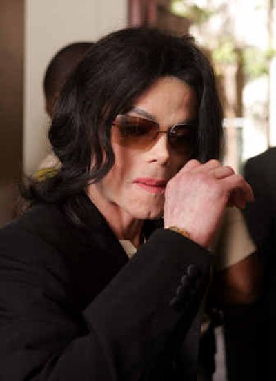 
Michael Jackson enters the courtroom Thursday after arriving late at Santa Barbara County Superior Court. 
 (Associated Press / The Spokesman-Review)