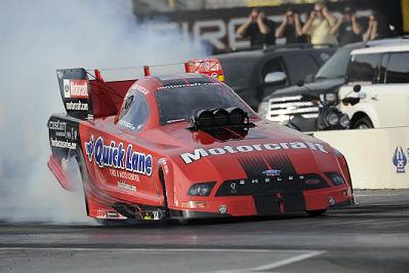 Bob Tasca's Ford Mustang NHRA Full Throttle Funny Car in action earlier this season. (Photo courtesy NHRA) (The Spokesman-Review)