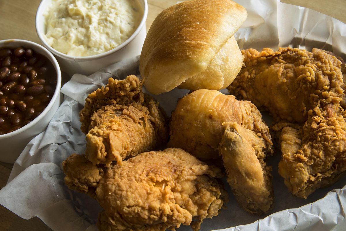 Ezell’s Famous Fried Chicken: The four-piece combo chicken dinner with sides of potato salad and baked beans is $12.99. (Colin Mulvany / The Spokesman-Review)
