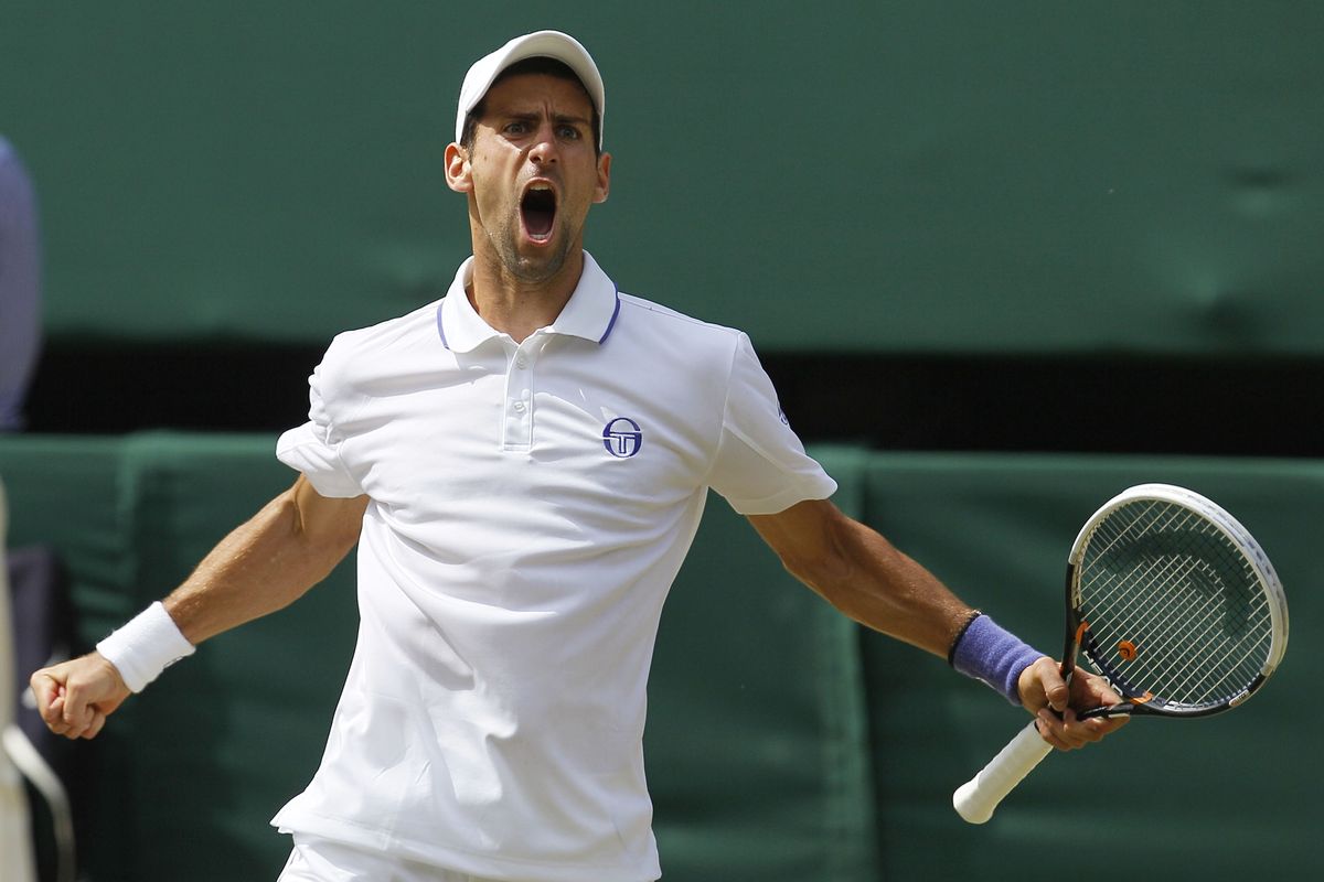 New world No. 1 Novak Djokovic celebrates during his victory in the Wimbledon men