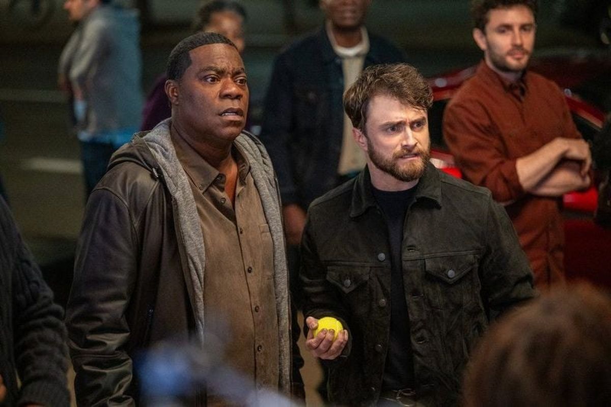 Arthur (Daniel Radcliffe, right) sets out to help the disgraced Reggie (Tracy Morgan) rehabilitate his image.  (Scott Gries/NBC)