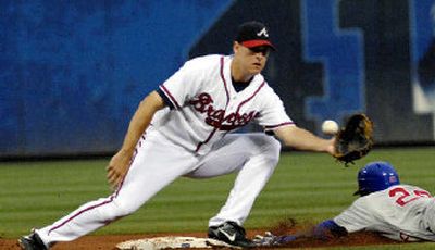 
Chicago's Felix Pie steals second ahead of the tag by Atlanta's Kelly Johnson.  
 (Associated Press / The Spokesman-Review)