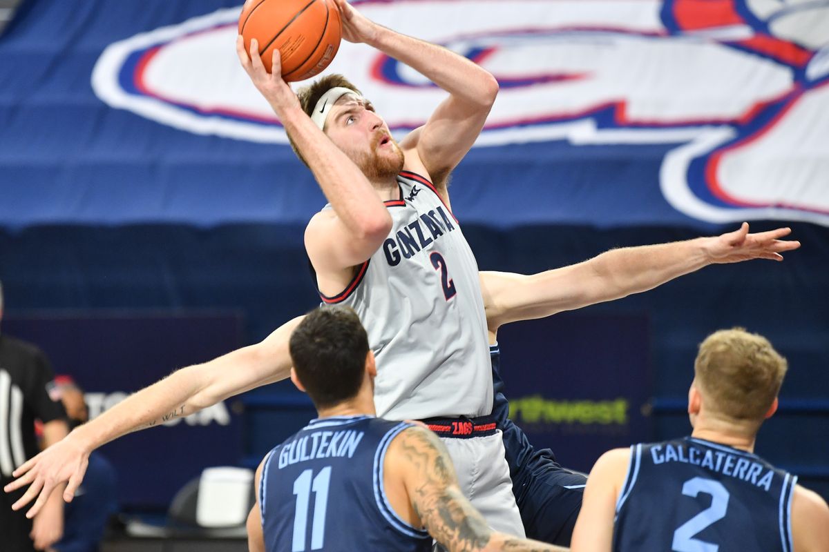 Gonzaga Bulldogs forward Drew Timme (2) drives to the hoop and scores during the first half of a college basketball game on Saturday, February 20, 2021, at McCarthey Athletic Center in Spokane, Wash. Gonzaga led 51-22 at the half.  (Tyler Tjomsland/The Spokesman-Review)