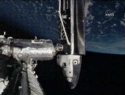 
In this image made from NASA video, the Space Shuttle Atlantis is seen docked with the space station, with the Earth seen above. Associated Press
 (Associated Press / The Spokesman-Review)