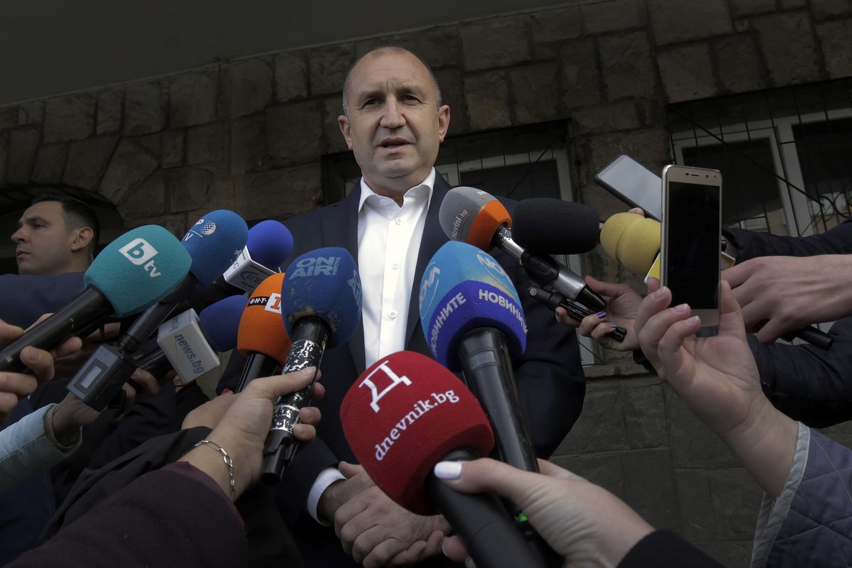 Bulgarian President Rumen Radev speaks to journalists after casting his vote in Sofia, Sunday, Nov. 21, 2021. Bulgarians are at the polls to choose a new president in a hotly contested runoff amid a COVID-19 surge and a political crisis that has gripped the European Union’s poorest country. The choice is between incumbent Rumen Radev and Sofia University rector Anastas Gerdzhikov.  (Valentina Petrova)