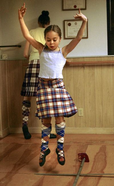 
Meaghan Palmer, 8, practices a dance during an recent Spokane Valley Highland Dancers practice at teacher Elizabeth Coyle's studio.
 (Liz Kishimoto / The Spokesman-Review)