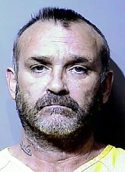 Walter L. Miles, 55, of Coeur d'Alene (Kootenai County Sheriff's Office booking photo)