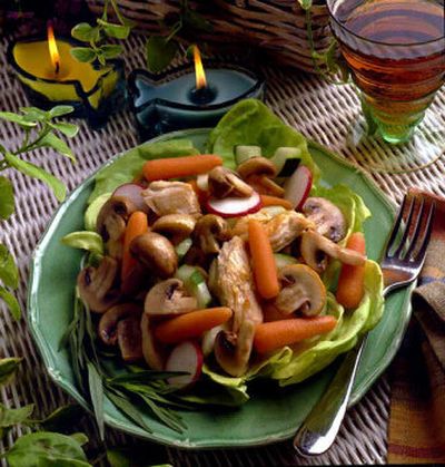 
Add this Warm Mushroom and Chicken Salad to your menu. With its sautêed mushrooms and tarragon dressing, it has a pleasing blend of textures and flavors.
 (King Features Syndicate / The Spokesman-Review)