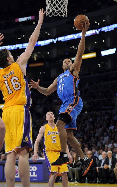 Oklahoma City’s Derek Fisher scored seven points in his first game against his former Los Angeles Lakers teammates. (Associated Press)