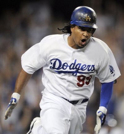 The Dodgers are producing a poster depicting Manny Ramirez’s pinch-hit grand slam Wednesday. The posters will be given away to the first 20,000 fans Aug. 5. (Associated Press / The Spokesman-Review)