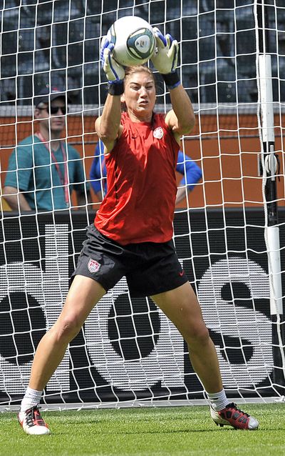 United States star goalkeeper Hope Solo exercises during practice Tuesday. (Associated Press)