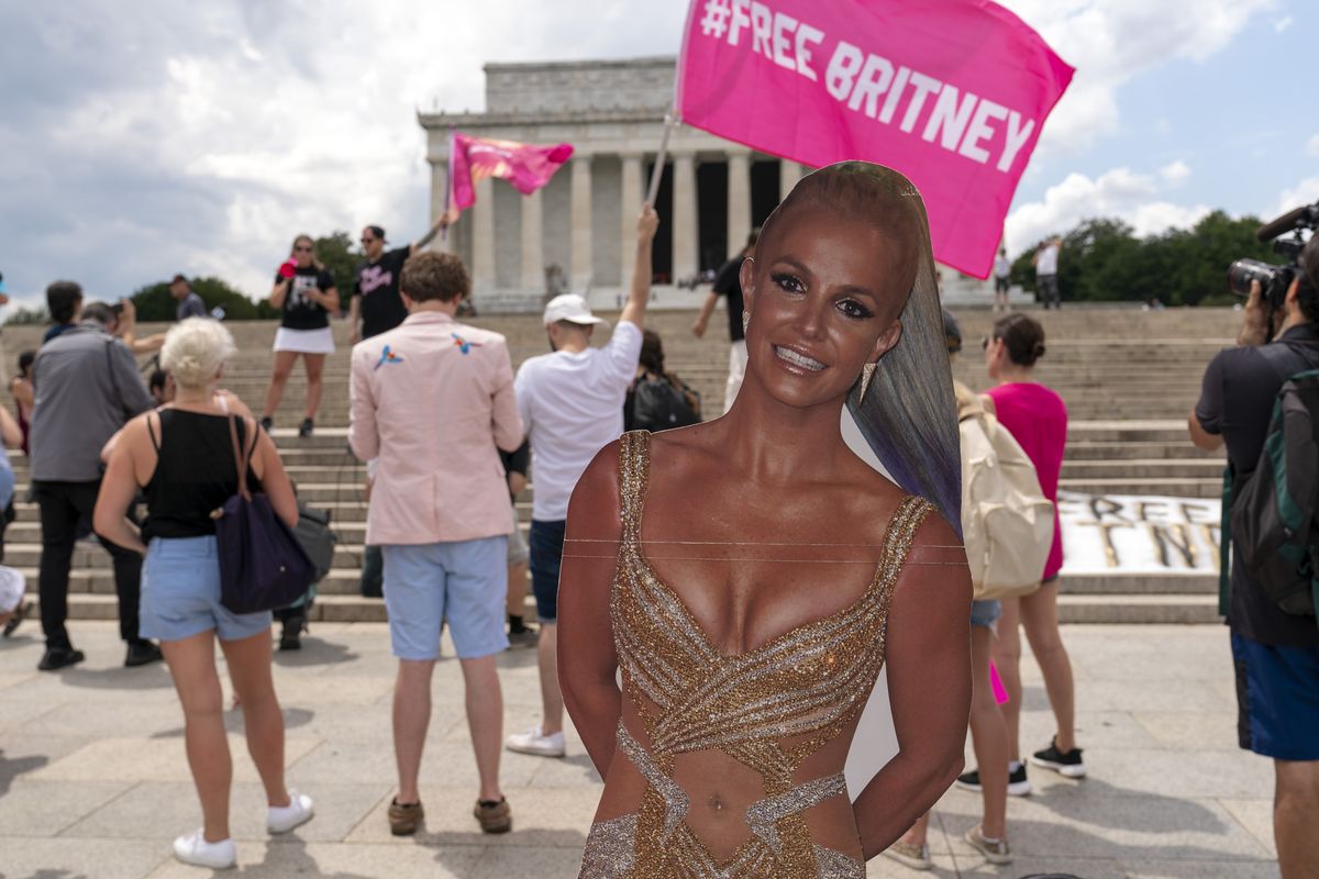 Fans and supporters of pop star Britney Spears protest at the Lincoln Memorial, during the "Free Britney" rally, Wednesday, July 14, 2021, in Washington. Rallies have been taking place across the country since the pop star spoke out against her conservatorship in court last month.  (Jose Luis Magana)