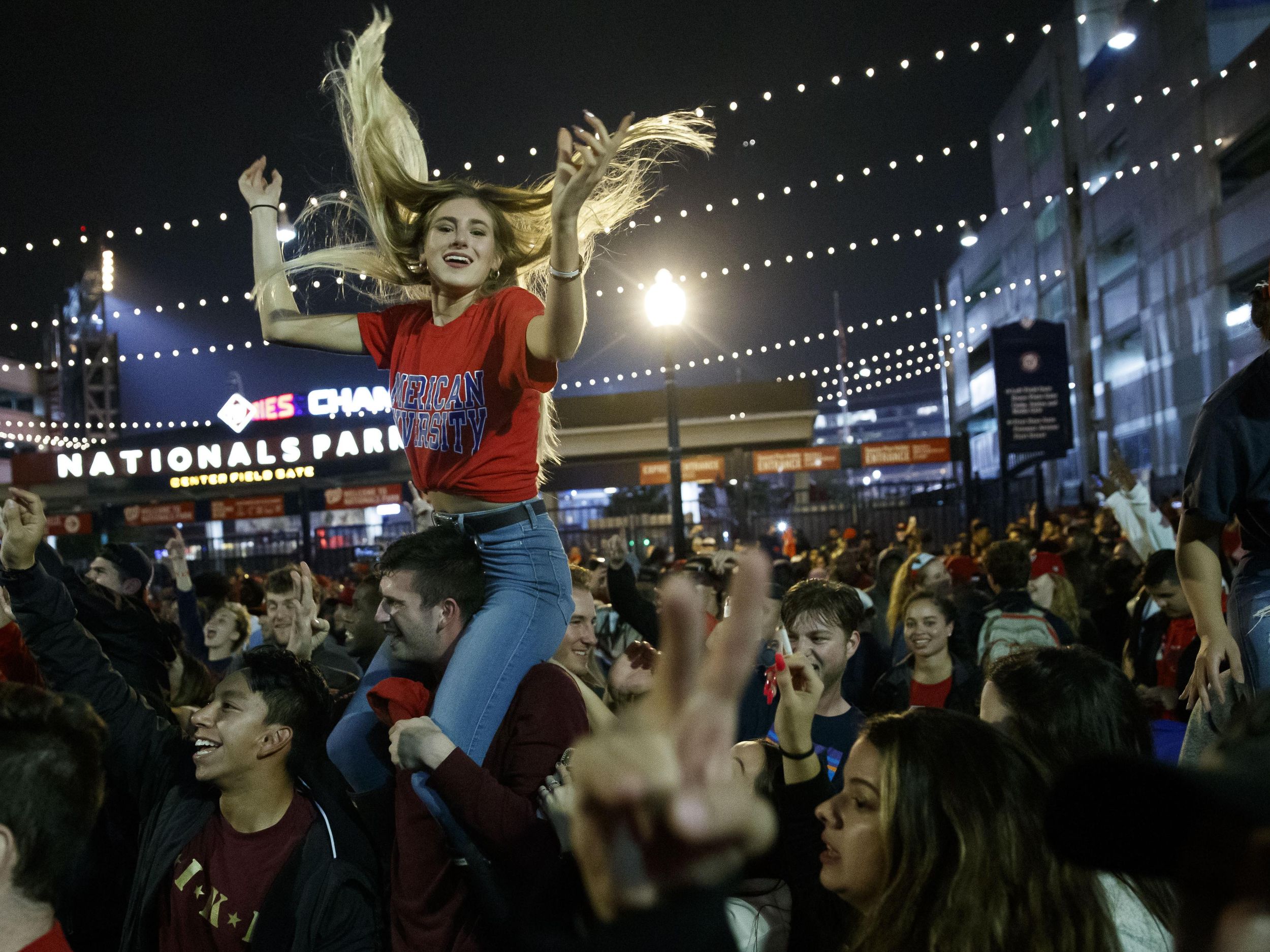 Nats fans celebrate win — without climbing the light poles