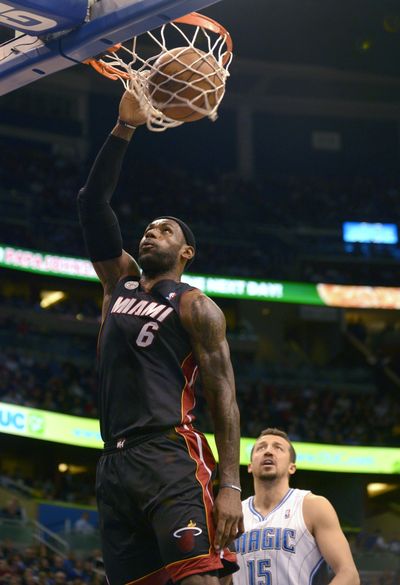 LeBron James had eight points in overtime win over Orlando. (Associated Press)