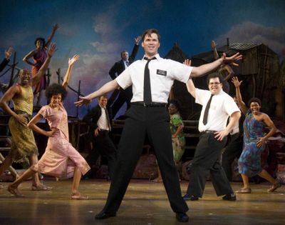 Andrew Rannells, center, performed in “The Book of Mormon” at the Eugene O’Neill Theatre in New York before leaving for the short-lived NBC series “The New Normal.” (Associated Press)