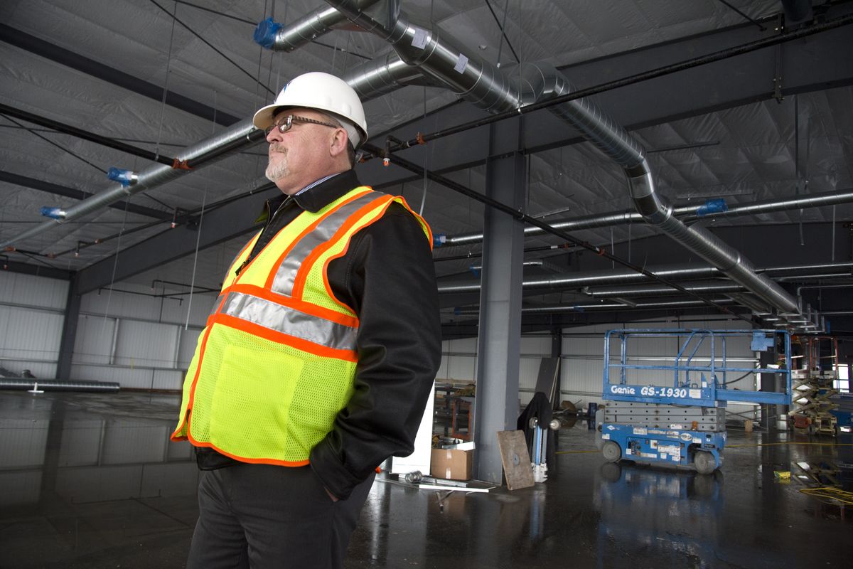 Ken Gimpel, assistant utilities division director, solid waste/fleet services for the city of Spokane, stands in one of the upper spaces of the city’s new consolidated maintenance shop Tuesday. (Jesse Tinsley)