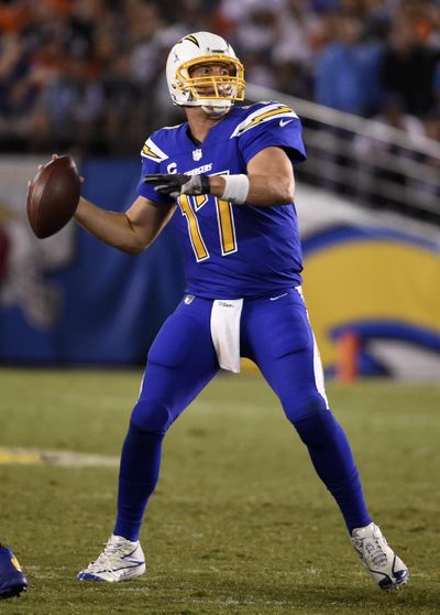 Chargers QB Philip Rivers broke the franchise record for career passing yards. (Denis Poroy / Associated Press)
