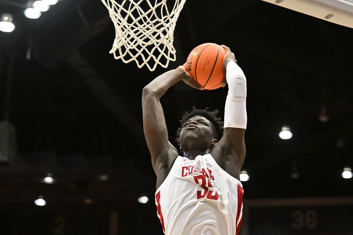 Washington State post Mouhamed Gueye goes up for a dunk during a Pac-12 game against Oregon State on Feb. 16 at Beasley Coliseum in Pullman. Gueye landed on the all-conference first team when postseason awards were announced Tuesday.  (WSU Athletics)