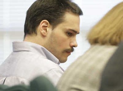 
Erick Hall listens Monday at the Ada County Courthouse in Boise as his attorney files a motion for a mistrial, which was denied. Moments earlier, Hall was found guilty of first-degree murder and rape for killing Cheryl Ann Hanlon in 2003. The Idaho Statesman
 (Katherine Jones The Idaho Statesman / The Spokesman-Review)