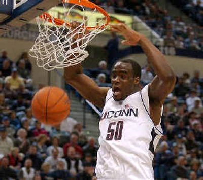 
Connecticut's Emeka Okafor will be taken with one of the top two picks in today's draft, either No. 1 by Orlando or No. 2 by Charlotte. 
 (Associated Press / The Spokesman-Review)
