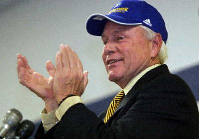 
Veteran coach Dick Tomey gave a cheer after accepting the job at San Jose State. 
 (File/Associated Press / The Spokesman-Review)