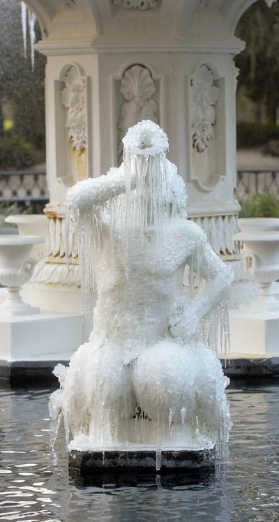 Icicles form on the tritons in the Forsyth Park Fountain Tuesday morning, Jan. 2, 2018, in Savannah, Ga. (Steve Bisson / Associated Press)