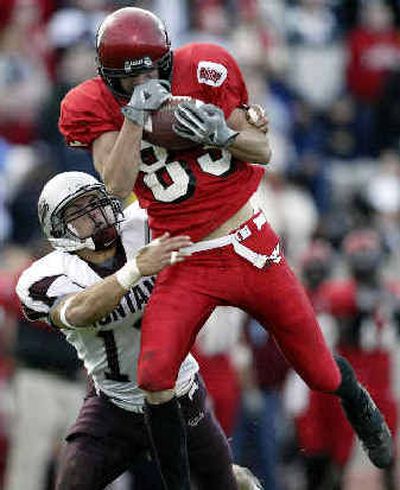 
Eastern Washington receiver Craig McIntyre, hauling down a long pass against Montana, has gained a sense of belonging. 
 (Associated Press / The Spokesman-Review)