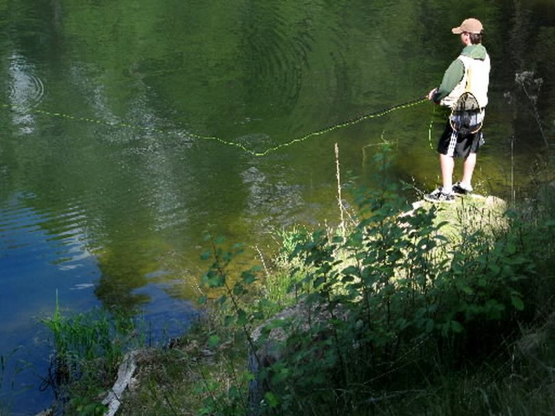A teenage fly fisher in action at a northeastern Washington fly-fishing lake. (Rich Landers)
