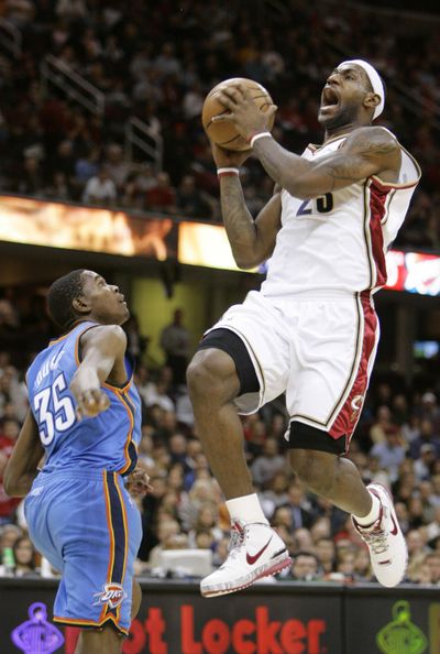 LeBron James played a career-low 17 minutes but still scored 14 points. (Associated Press / The Spokesman-Review)