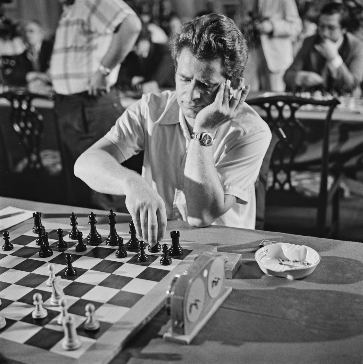 Above: Soviet chess champion Boris Spassky during a chess tournament on July 11, 1973, in the United Kingdom. At left: Boris Spassky attends the opening ceremony of the World Rapid and Blitz Chess Championship on Oct. 9, 2015, at Kino International in Berlin. (Evening Standard)