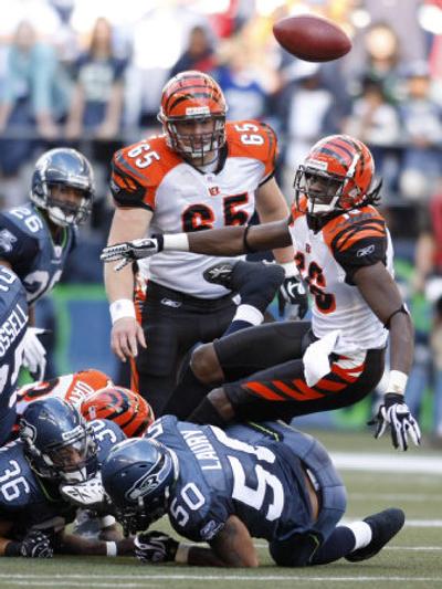 
Cincinnati Bengals' Glenn Holt, right, fumbles in the final minute. Associated Press
 (Associated Press / The Spokesman-Review)