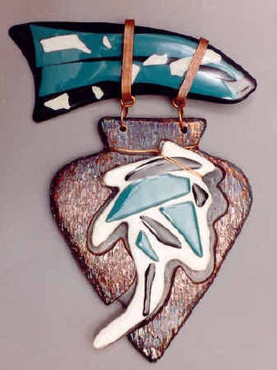 
Liz Bishop's raku and fused glass wall hanging is part of the Christmas Art Show at the William Grant Gallery in North Spokane.
 (The Spokesman-Review)