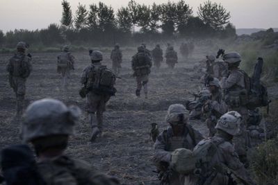 U.S. Marines  take part in a major offensive against the Taliban in the Nawa district of Afghanistan’s Helmand province  early Sunday.  (Associated Press / The Spokesman-Review)
